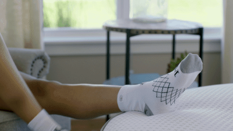 PILOI socks being worn